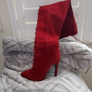Red thigh high boots